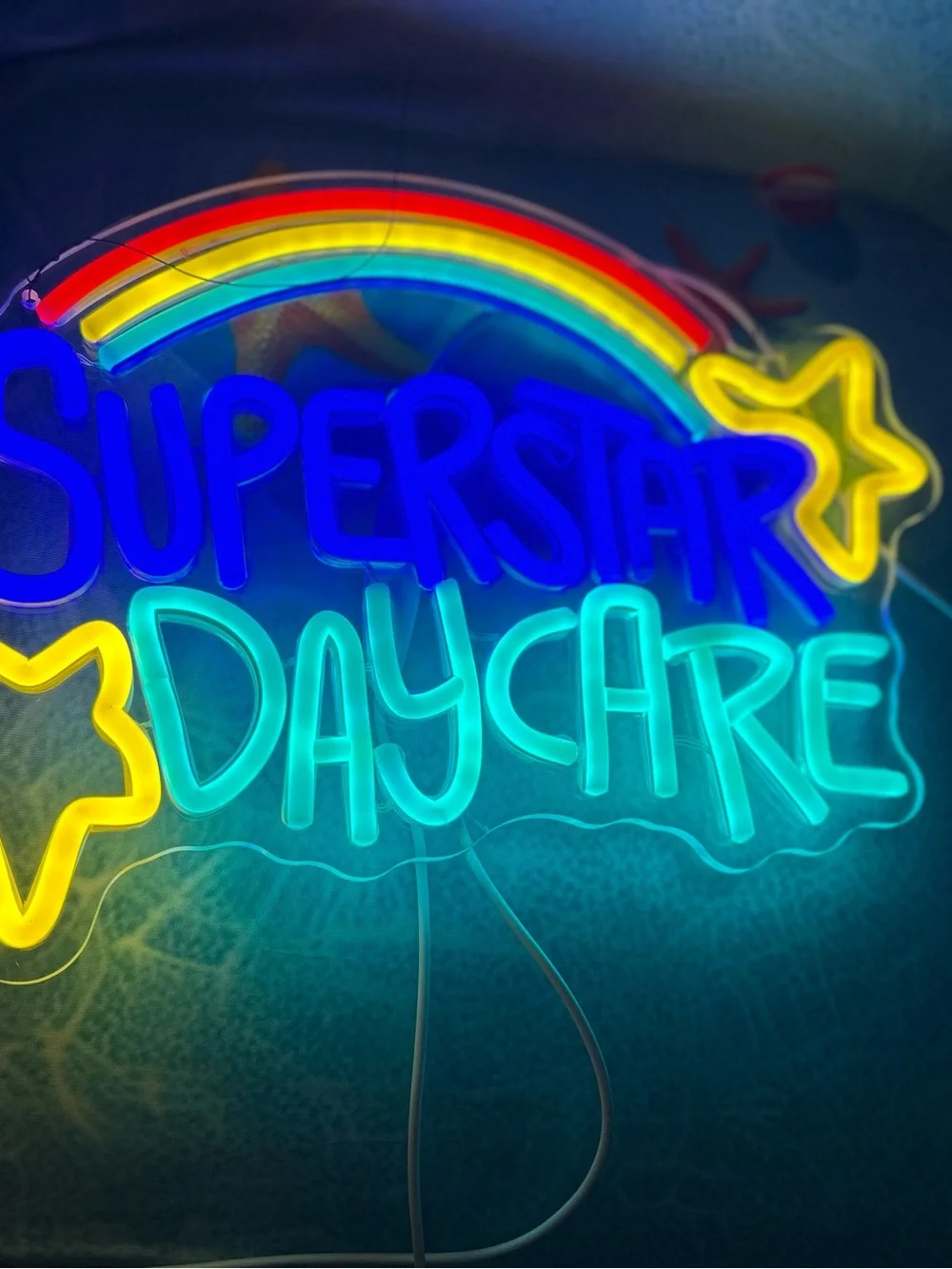 Neon 'Superstar Daycare' Sign - Blue, Teal, Yellow, Red